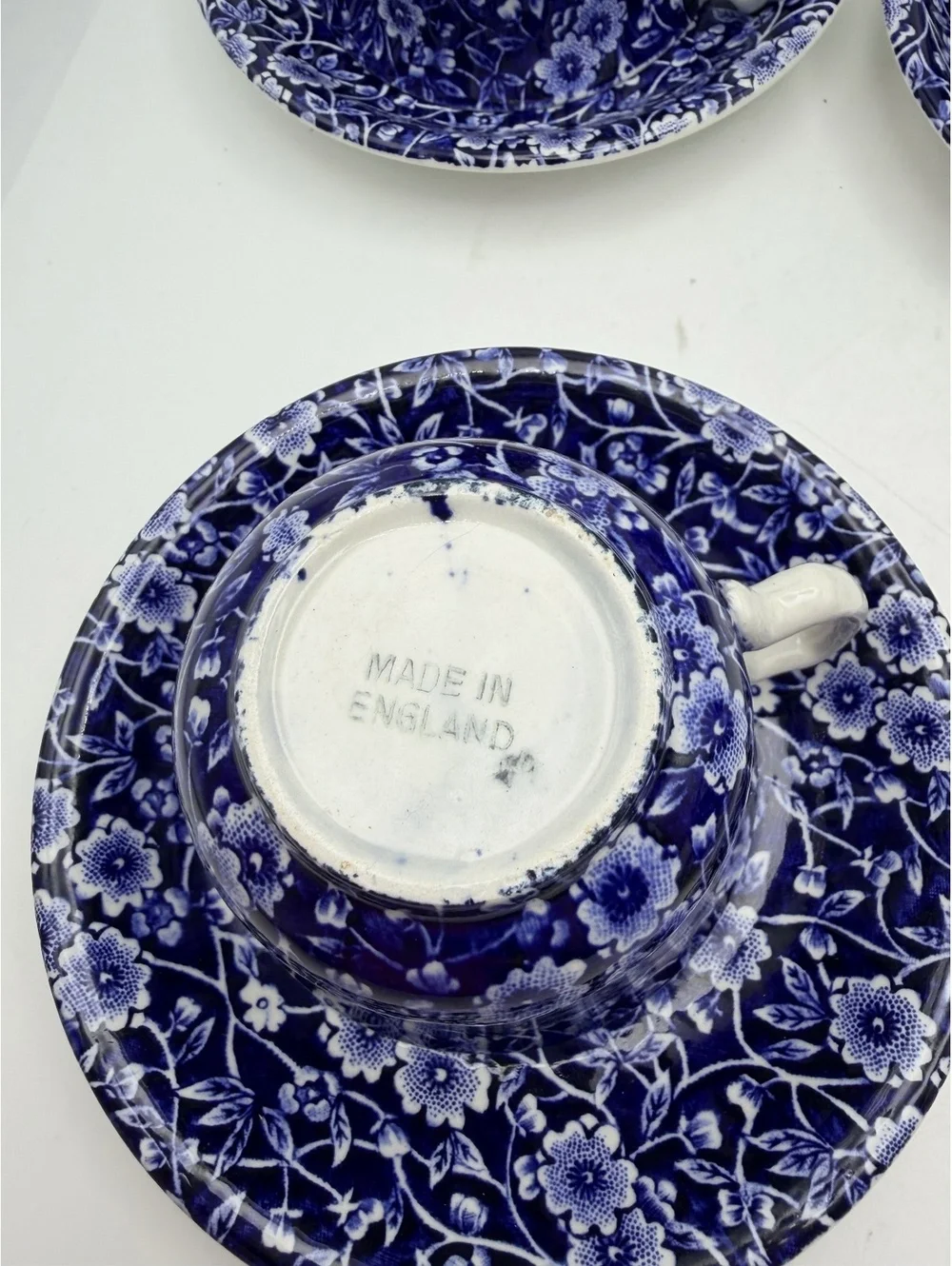 5 vintage sets of cups and saucers. Blue on white 1968 England.